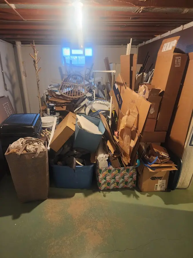 Roll-off dumpster container at job site for Concrete Dumpster Rental in Braintree Town